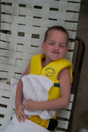 vacation2003noahsnoozingbythepool.jpg